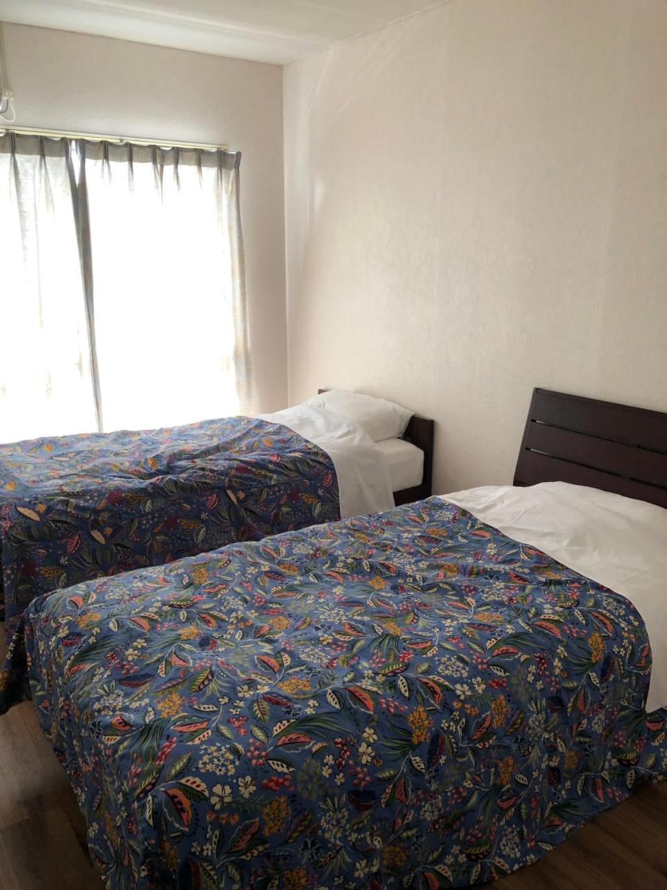 Eagle Lodge Chatan Exterior foto